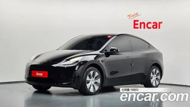 Tesla Model Y — фото 1