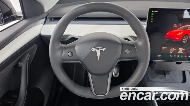 Tesla Model Y — фото 13