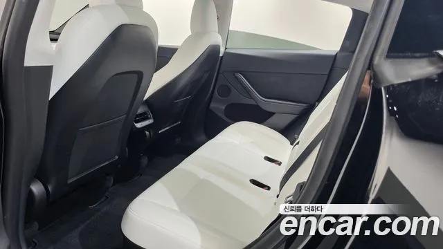 Tesla Model Y — фото 19