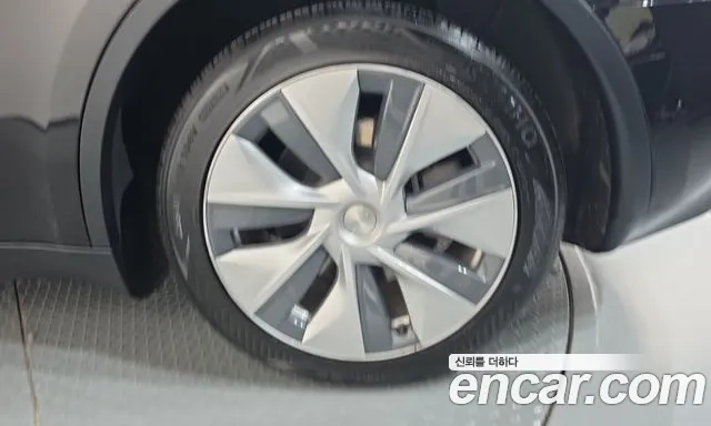 Tesla Model Y — фото 21