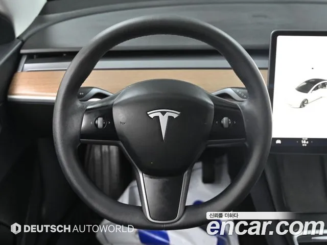 Tesla Model 3 — фото 13