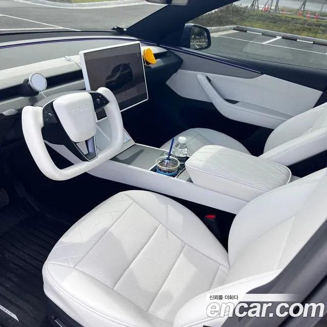 Tesla Model Y — фото 12