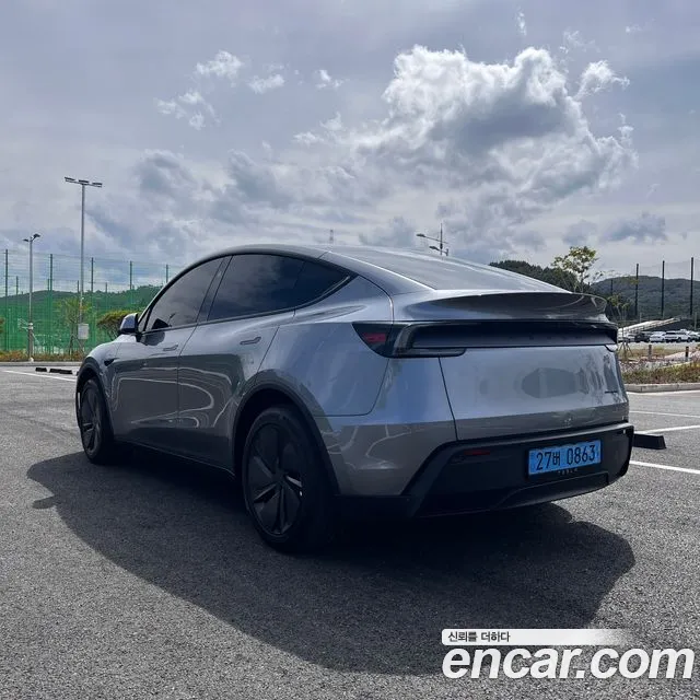 Tesla Model Y — фото 7