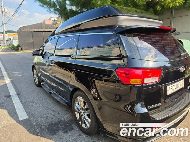 Kia Carnival — фото 12