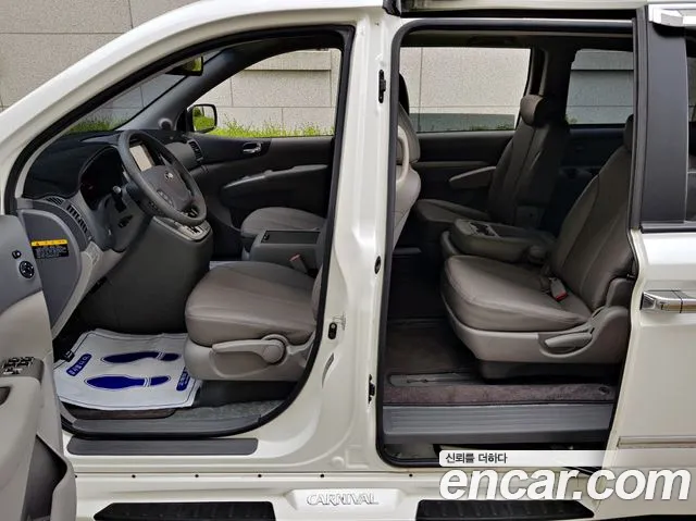 Kia Carnival — фото 10