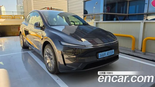 Tesla Model Y — фото 1