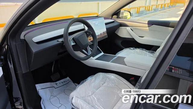 Tesla Model Y — фото 13