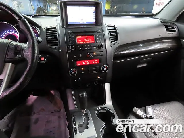 Kia Sorento — фото 17