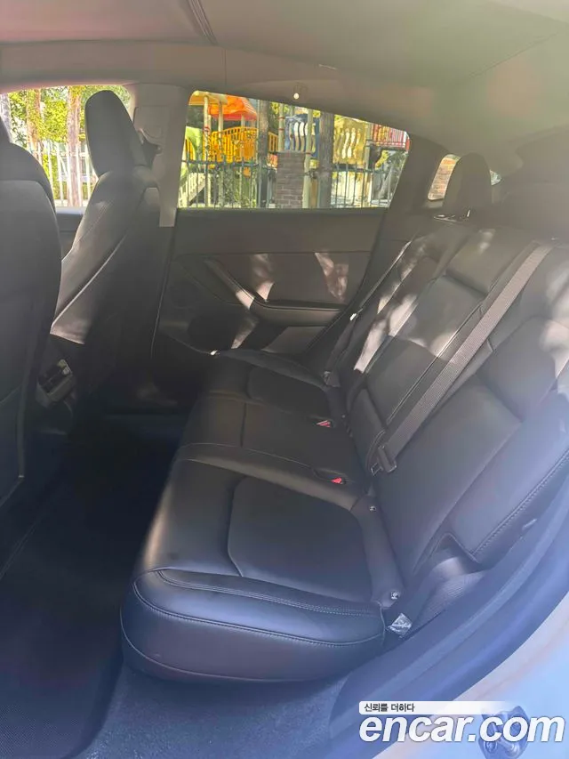 Tesla Model Y — фото 11