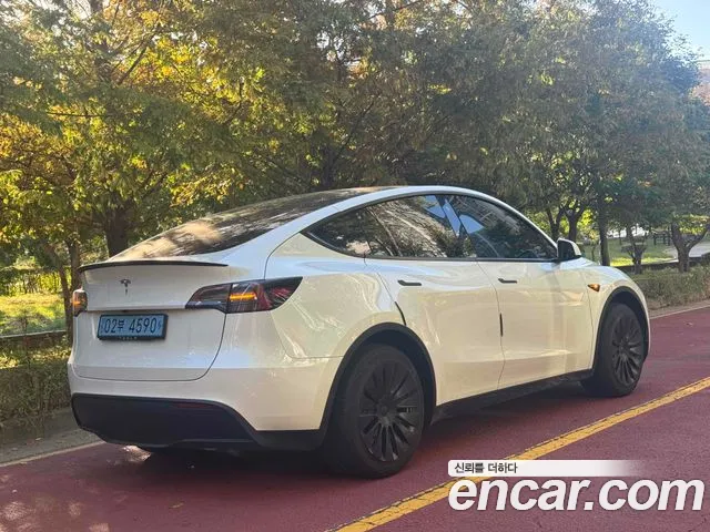Tesla Model Y — фото 4