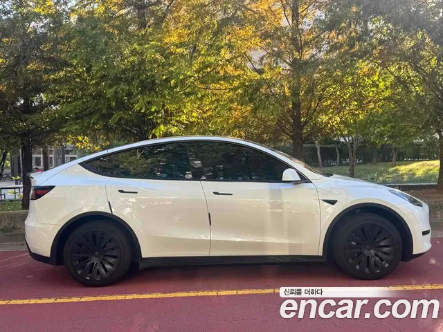 Tesla Model Y — фото 5