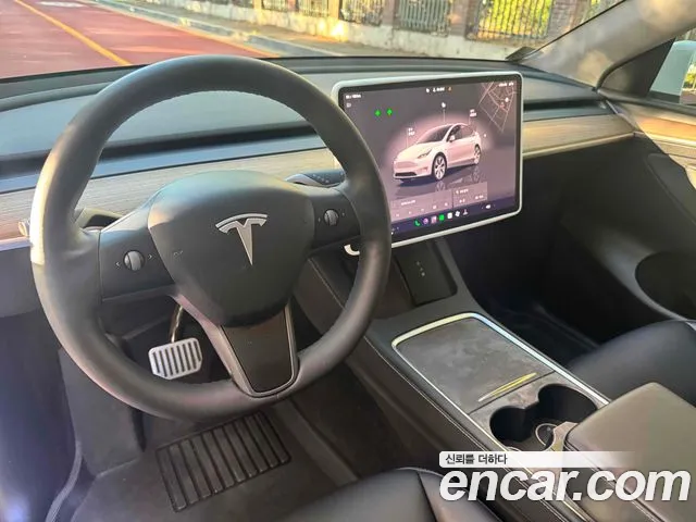 Tesla Model Y — фото 7