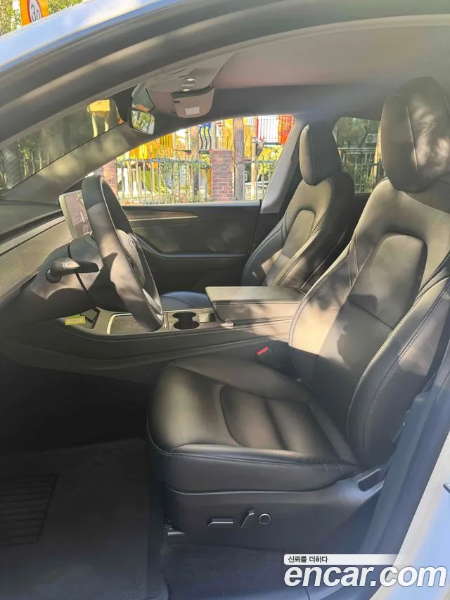 Tesla Model Y — фото 10