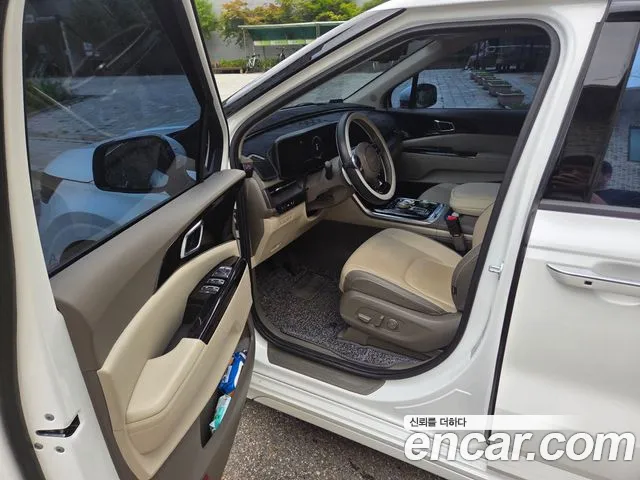 Kia Carnival — фото 11