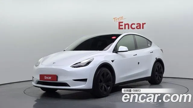 Tesla Model Y — фото 1