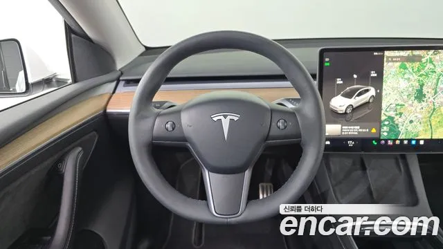 Tesla Model Y — фото 14