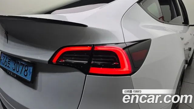 Tesla Model Y — фото 23