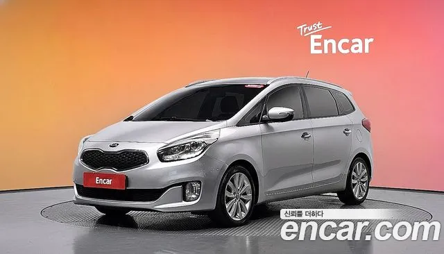 Kia Carens — фото 20