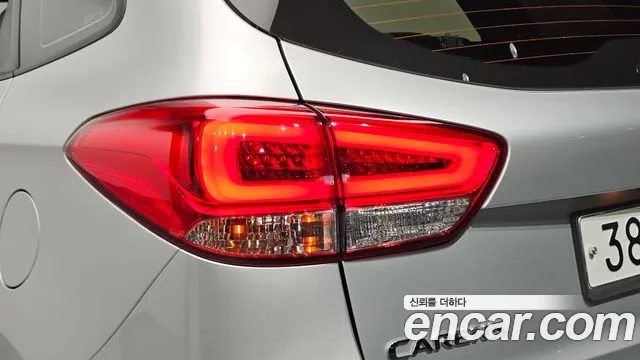 Kia Carens — фото 23