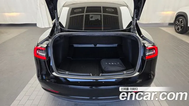 Tesla Model 3 — фото 20