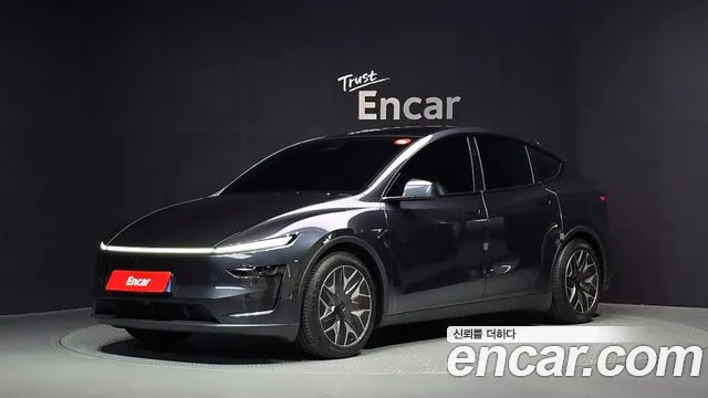 Tesla Model Y — фото 1