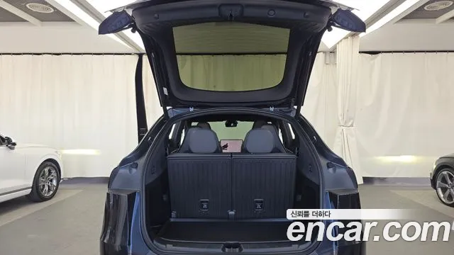 Tesla Model Y — фото 20