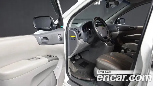 Kia Carnival — фото 10
