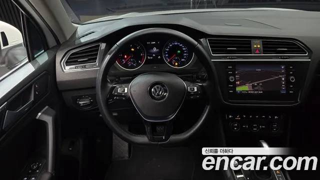 Volkswagen Tiguan — фото 13