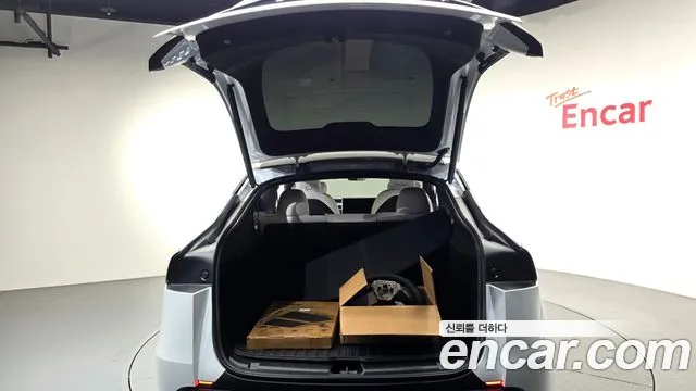 Tesla Model Y — фото 16