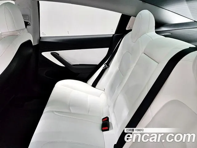 Tesla Model 3 — фото 11