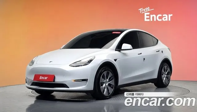 Tesla Model Y — фото 21