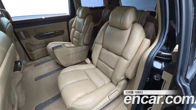 Kia Carnival — фото 11