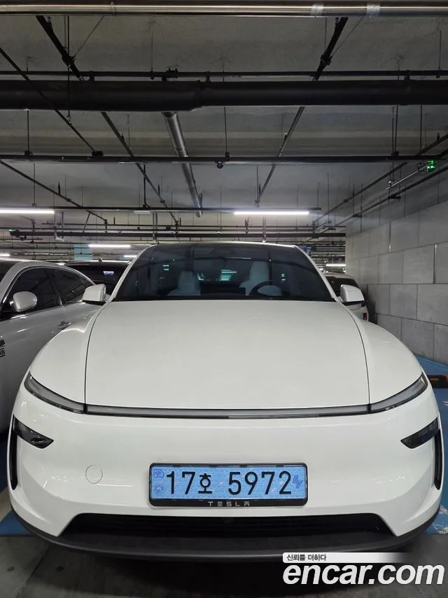 Tesla Model Y — фото 1