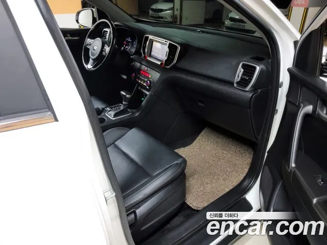 Kia Sportage — фото 11