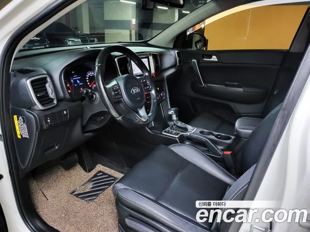 Kia Sportage — фото 9