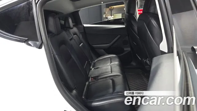 Tesla Model Y — фото 11