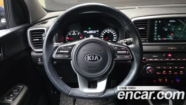 Kia Sportage — фото 14