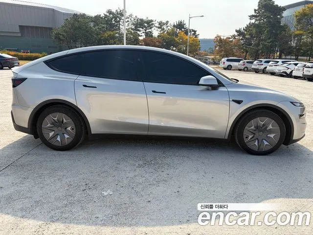 Tesla Model Y — фото 5