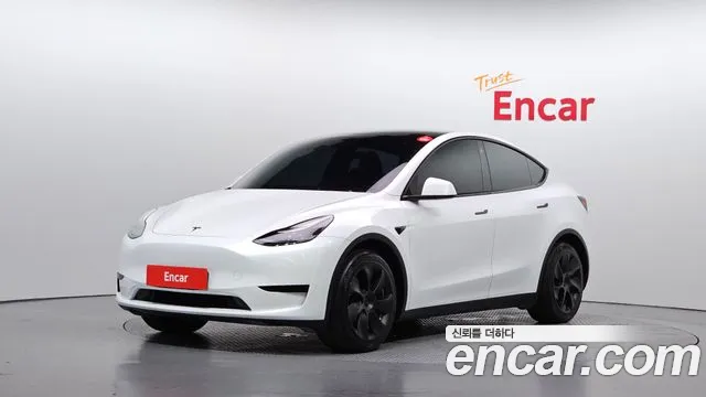 Tesla Model Y — фото 1