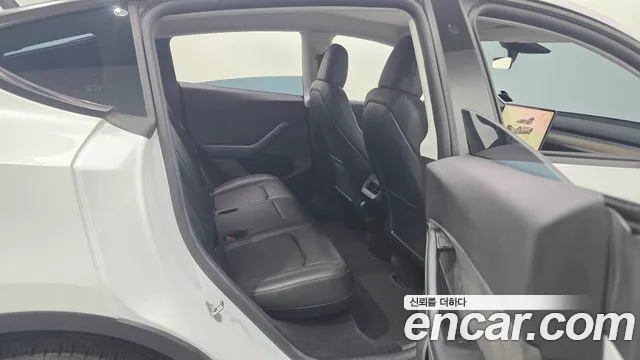 Tesla Model Y — фото 11