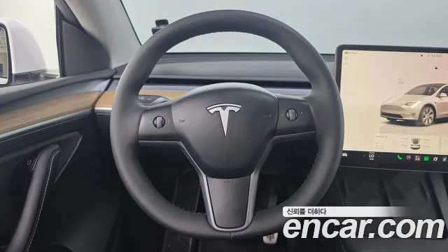 Tesla Model Y — фото 15