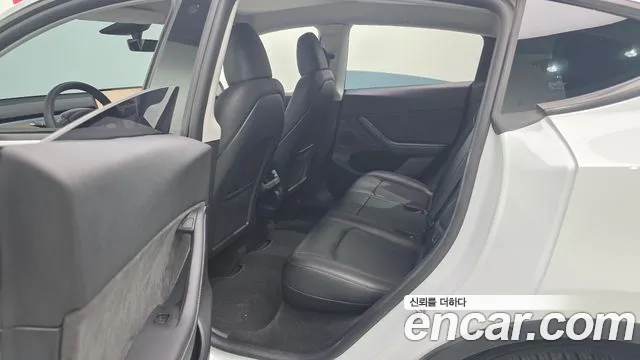 Tesla Model Y — фото 19