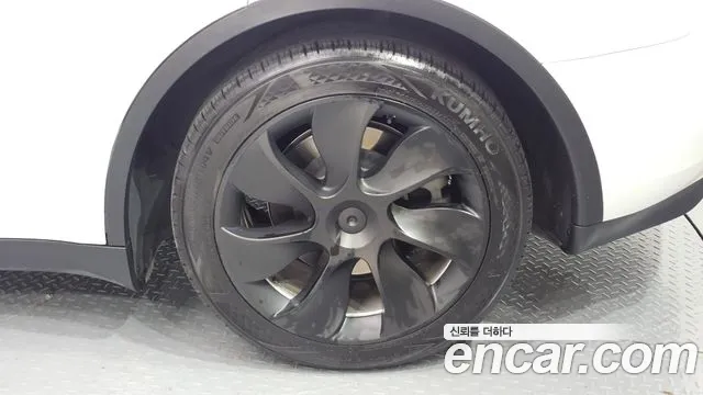 Tesla Model Y — фото 21