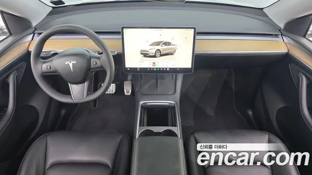 Tesla Model Y — фото 7