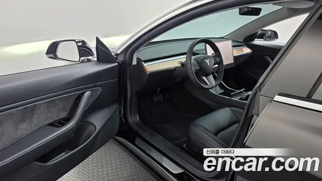 Tesla Model 3 — фото 10