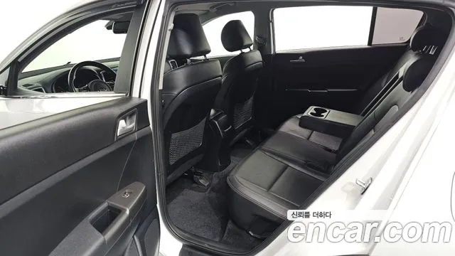 Kia Sportage — фото 11