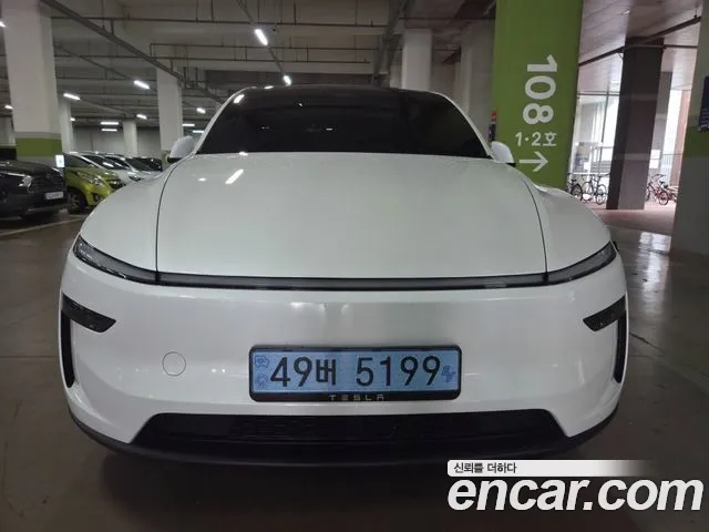 Tesla Model Y — фото 1