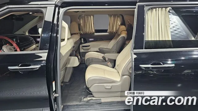 Kia Carnival — фото 11