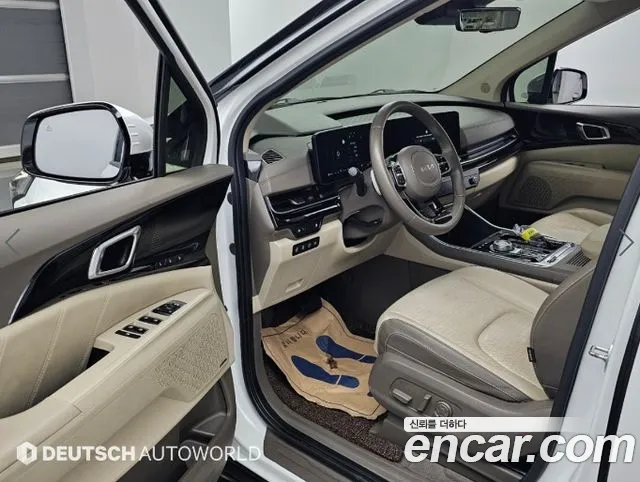 Kia Carnival — фото 11