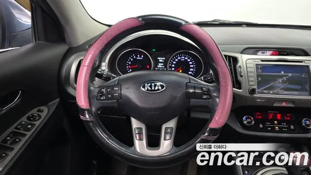 Kia Sportage — фото 12